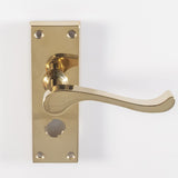 This is an image of Carlisle Brass - Contract Victorian Scroll Lever on Privacy Backplate - Polished available to order from T.H Wiggans Architectural Ironmongery in Kendal, quick delivery and discounted prices.