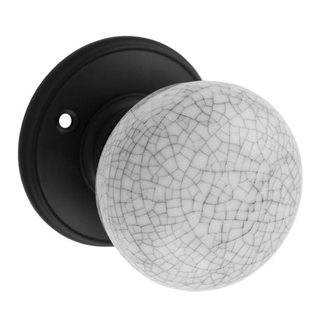 This is an image of Carlisle Brass - Delamain Porcelain Knob Midnight Crackle available to order from T.H Wiggans Architectural Ironmongery in Kendal, quick delivery and discounted prices.