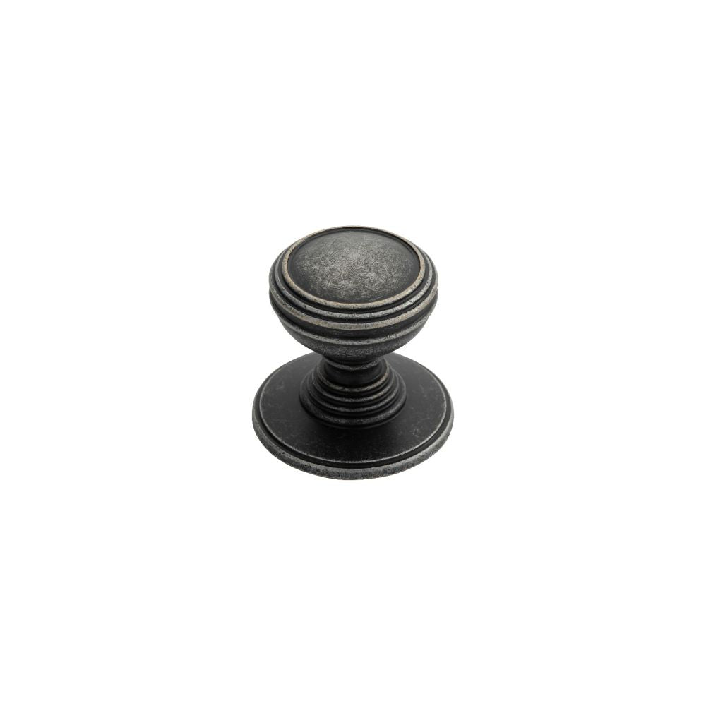 This is an image of a Delamain - Plain Knob 30mm - Pewter that is availble to order from T.H Wiggans Architectural Ironmongery in Kendal in Kendal.