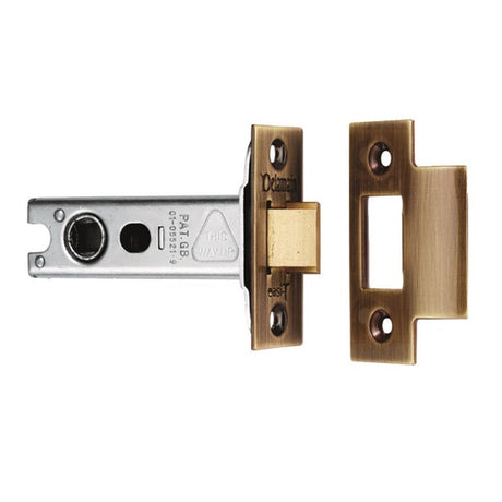 This is an image of a Carlisle Brass - Tubular Latch Heavy Sprung 102mm - Florentine Bronze that is availble to order from T.H Wiggans Architectural Ironmongery in Kendal.