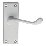 This is an image of Carlisle Brass - Victorian Scroll Lever on Short Latch Backplate - Satin Chrome available to order from T.H Wiggans Architectural Ironmongery in Kendal, quick delivery and discounted prices.
