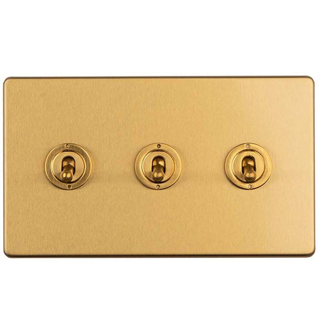 This is an image showing Eurolite Concealed 3mm 3 Gang 2 Way Toggle Switch - Satin Brass ecsbt3sw available to order from T.H. Wiggans Ironmongery in Kendal, quick delivery and discounted prices.