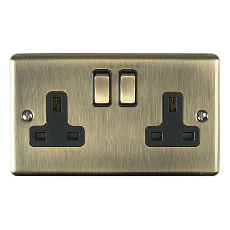This is an image showing Eurolite Enhance Decorative 2 Gang Socket - Antique Brass (With Black Trim) en2soabb available to order from T.H. Wiggans Ironmongery in Kendal, quick delivery and discounted prices.