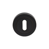 This is an image of Carlisle Brass - Lock Escutcheon - Matt Black available to order from T.H Wiggans Architectural Ironmongery in Kendal, quick delivery and discounted prices.