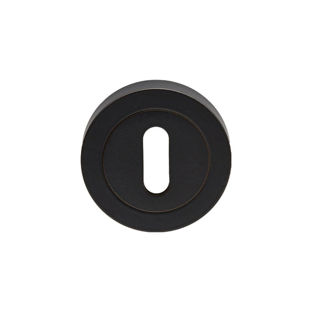 This is an image of Carlisle Brass - Lock Escutcheon - Matt Black available to order from T.H Wiggans Architectural Ironmongery in Kendal, quick delivery and discounted prices.