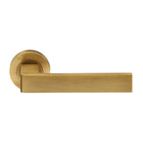 This is an image of Carlisle Brass - Sasso Lever on Rose - Antique Brass available to order from T.H Wiggans Architectural Ironmongery in Kendal, quick delivery and discounted prices.