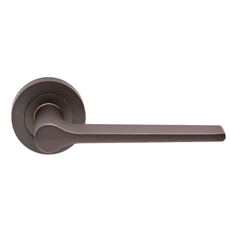 This is an image of Carlisle Brass - Velino Lever on Round Rose - Matt Bronze available to order from T.H Wiggans Architectural Ironmongery in Kendal, quick delivery and discounted prices.