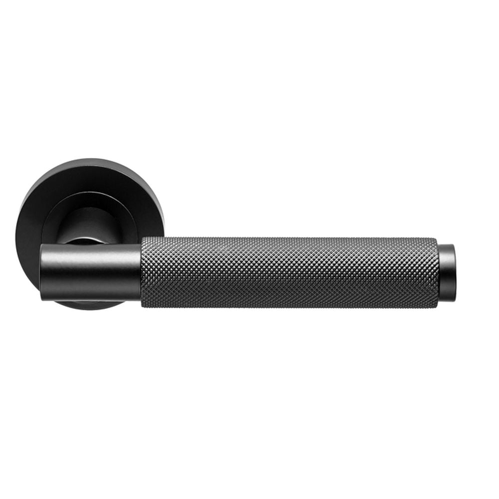 This is an image of Carlisle Brass - Varese Knurled Lever on Rose - Matt Black available to order from T.H Wiggans Architectural Ironmongery in Kendal, quick delivery and discounted prices.