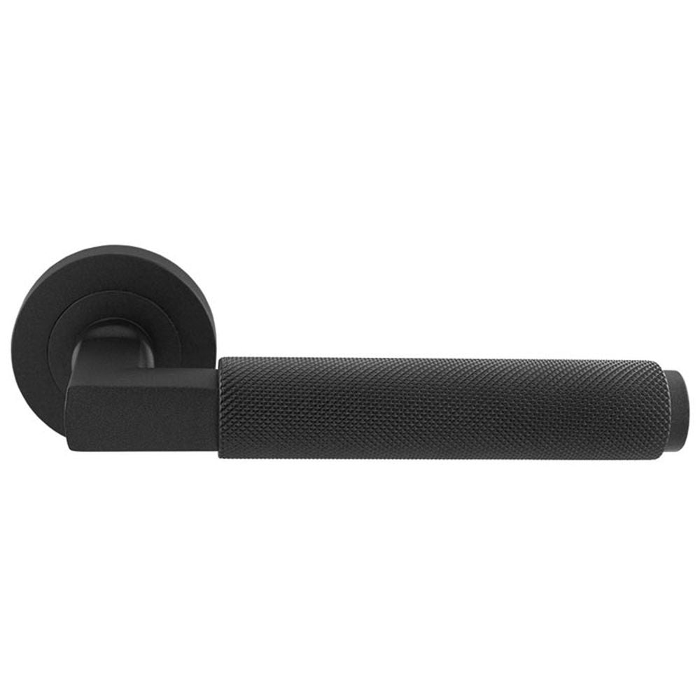 This is an image of Carlisle Brass - Terazzo Lever On Round Rose - Matt Black available to order from T.H Wiggans Architectural Ironmongery in Kendal, quick delivery and discounted prices.