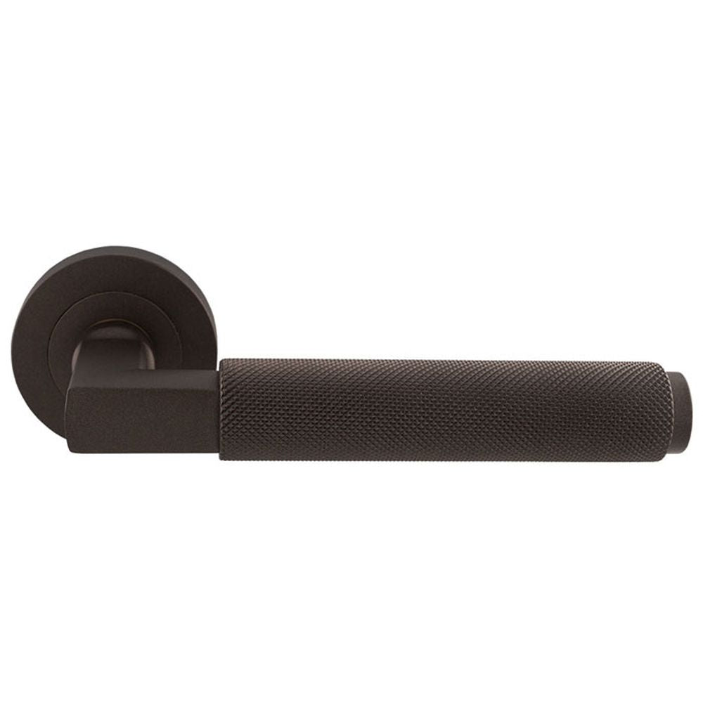 This is an image of Carlisle Brass - Terazzo Lever On Round Rose - Matt Bronze available to order from T.H Wiggans Architectural Ironmongery in Kendal, quick delivery and discounted prices.