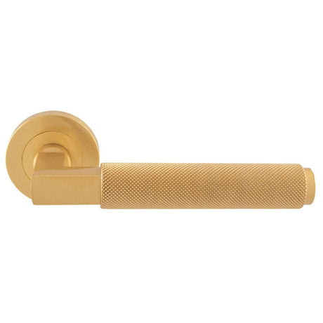 This is an image of Carlisle Brass - Terazzo Lever On Round Rose - Satin Brass available to order from T.H Wiggans Architectural Ironmongery in Kendal, quick delivery and discounted prices.