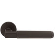 This is an image of Carlisle Brass - Masano Lever On Rose - Matt Bronze available to order from T.H Wiggans Architectural Ironmongery in Kendal, quick delivery and discounted prices.