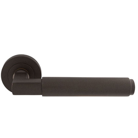 This is an image of Carlisle Brass - Masano Lever On Rose - Matt Bronze available to order from T.H Wiggans Architectural Ironmongery in Kendal, quick delivery and discounted prices.