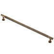 This is an image of a Carlisle Brass - Lines Pull Handle 320mm c/c - Antique Brass that is availble to order from T.H Wiggans Architectural Ironmongery in Kendal in Kendal.