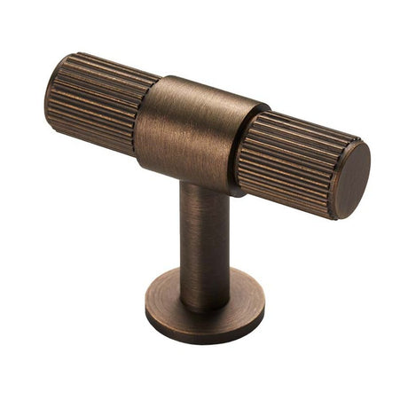 This is an image of a Carlisle Brass - Lines T-bar knob - Antique Brass that is availble to order from T.H Wiggans Architectural Ironmongery in Kendal in Kendal.