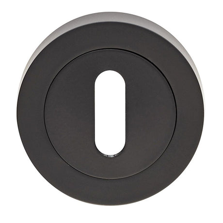 This is an image of Carlisle Brass - Standard profile Escutcheon - Matt Black available to order from T.H Wiggans Architectural Ironmongery in Kendal, quick delivery and discounted prices.