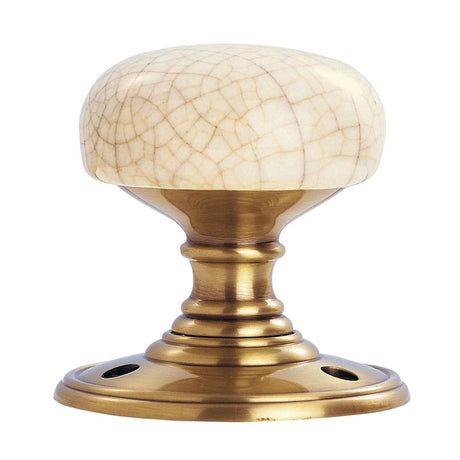 This is an image of Carlisle Brass - Delamain Porcelain Mortice Knobs Ivory Crackle available to order from T.H Wiggans Architectural Ironmongery in Kendal, quick delivery and discounted prices.