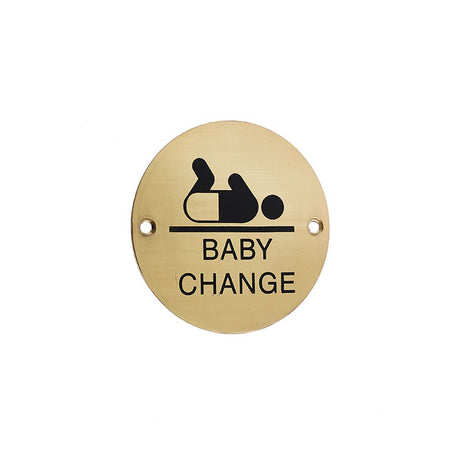 This is an image showing the Frelan - Baby Change - Signage 75mm Dia. - Polished Brass available to order from T.H. Wiggans Ironmongery in Kendal