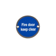 This is an image showing the Frelan - Fire Door Keep Clear - Signage 75mm Dia. - Polished Stainless Steel available to order from T.H. Wiggans Ironmongery in Kendal