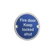 This is an image showing the Frelan - Fire Door Keep Locked Shut - Signage 75mm Dia. - Polished Stainless Ste available to order from T.H. Wiggans Ironmongery in Kendal