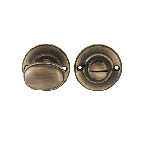 This is an image showing the Frelan - Oval Ringed Turn & Release - Antique Brass available to order from T.H. Wiggans Ironmongery in Kendal