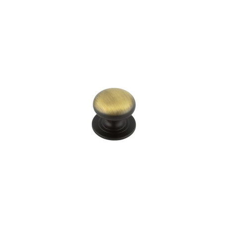 This is an image showing the Frelan - 32mm AB Cupboard knob available to order from T.H. Wiggans Ironmongery in Kendal