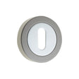 This is an image showing the Frelan - Standard Key Profile Escutcheons - Polished Chrome/Black Nickel available to order from T.H. Wiggans Ironmongery in Kendal