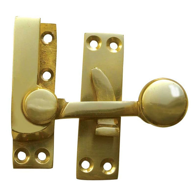 This is an image showing the Frelan - Quadrant Sash Fastener - Polished Brass available to order from T.H. Wiggans Ironmongery in Kendal