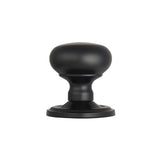 This is an image of Carlisle Brass - Concealed Fix Mushroom Mortice Knob - Matt Black available to order from T.H Wiggans Architectural Ironmongery in Kendal, quick delivery and discounted prices.