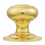 This is an image of Carlisle Brass - Centre Door Knob - Polished Brass available to order from T.H Wiggans Architectural Ironmongery in Kendal, quick delivery and discounted prices.