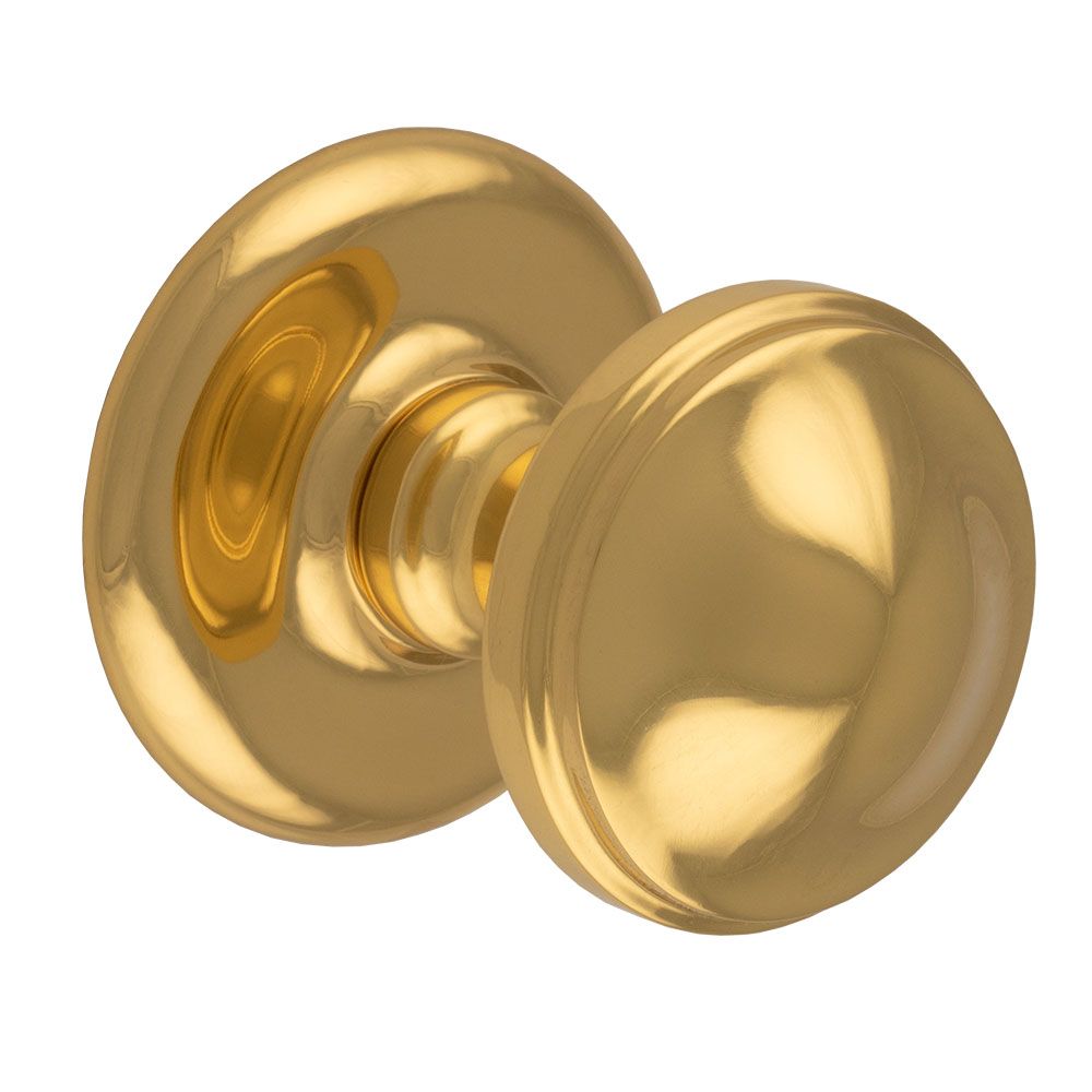 This is an image of Carlisle Brass - Round Centre Door Knob - Polished Brass available to order from T.H Wiggans Architectural Ironmongery in Kendal, quick delivery and discounted prices.