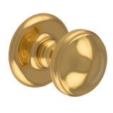 This is an image of Carlisle Brass - Round Centre Door Knob - Polished Brass available to order from T.H Wiggans Architectural Ironmongery in Kendal, quick delivery and discounted prices.