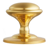 This is an image of Carlisle Brass - Round Centre Door Knob - Polished Brass available to order from T.H Wiggans Architectural Ironmongery in Kendal, quick delivery and discounted prices.