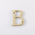 This is an image of Carlisle Brass - Letter B - Polished Brass available to order from T.H Wiggans Architectural Ironmongery in Kendal, quick delivery and discounted prices.