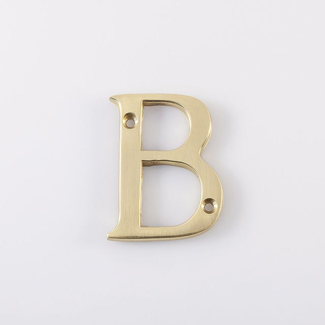 This is an image of Carlisle Brass - Letter B - Polished Brass available to order from T.H Wiggans Architectural Ironmongery in Kendal, quick delivery and discounted prices.