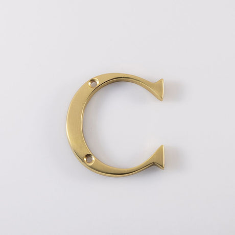 This is an image of Carlisle Brass - Letter C - Polished Brass available to order from T.H Wiggans Architectural Ironmongery in Kendal, quick delivery and discounted prices.