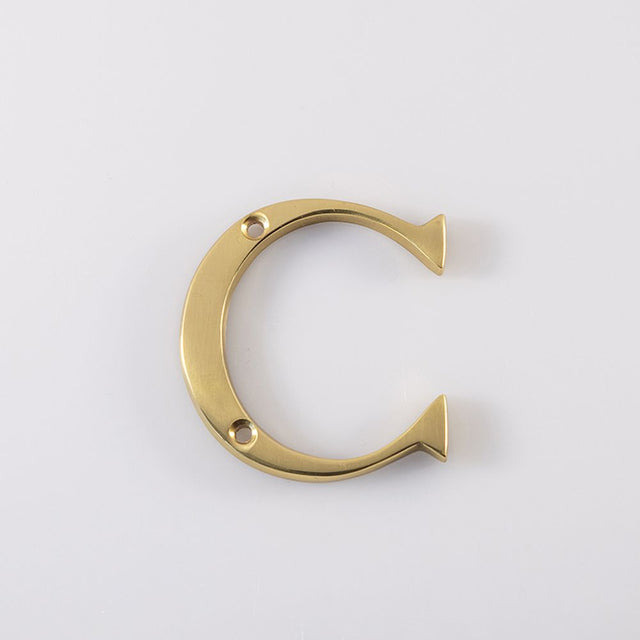 This is an image of Carlisle Brass - Letter C - Polished Brass available to order from T.H Wiggans Architectural Ironmongery in Kendal, quick delivery and discounted prices.
