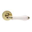 This is an image of Carlisle Brass - Porcelain Lever on Round Rose Plain White - Plain White/Polishe available to order from T.H Wiggans Architectural Ironmongery in Kendal, quick delivery and discounted prices.