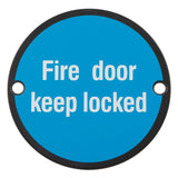 This is an image of Carlisle Brass - Signage Fire Door - Keep Locked - Matt Black available to order from T.H Wiggans Architectural Ironmongery in Kendal, quick delivery and discounted prices.
