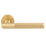 This is an image of Manital - Syntax Lever On round Rose - Satin Brass available to order from T.H Wiggans Architectural Ironmongery in Kendal, quick delivery and discounted prices.