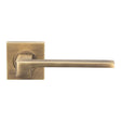 This is an image of Serozzetta - Equi Lever on Square Rose - Antique Brass available to order from T.H Wiggans Architectural Ironmongery in Kendal, quick delivery and discounted prices.