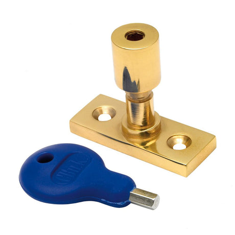 This is an image of a Carlisle Brass - Locking Casement Stay Pin - Polished Brass that is availble to order from T.H Wiggans Architectural Ironmongery in Kendal in Kendal.