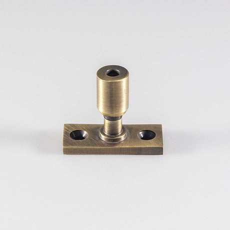 This is an image of a Carlisle Brass - Locking Casement Stay Pin - Florentine Bronze that is availble to order from T.H Wiggans Architectural Ironmongery in Kendal in Kendal.